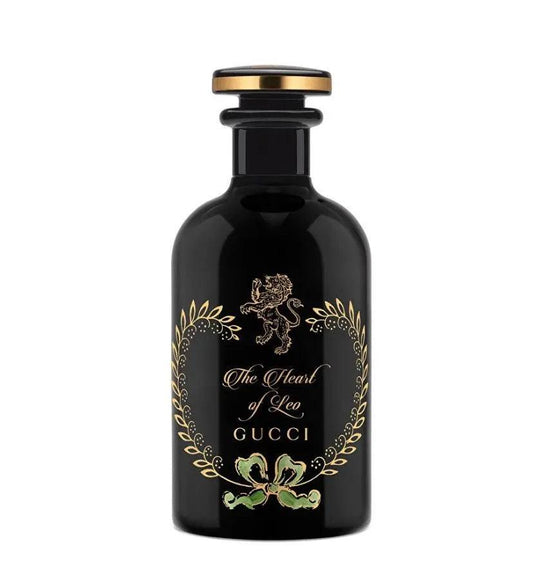 Gucci Alchemists Garden The Heart of Leo 100ml EDP şişesi, lüks parfüm şişesi ve yeşil detaylar.